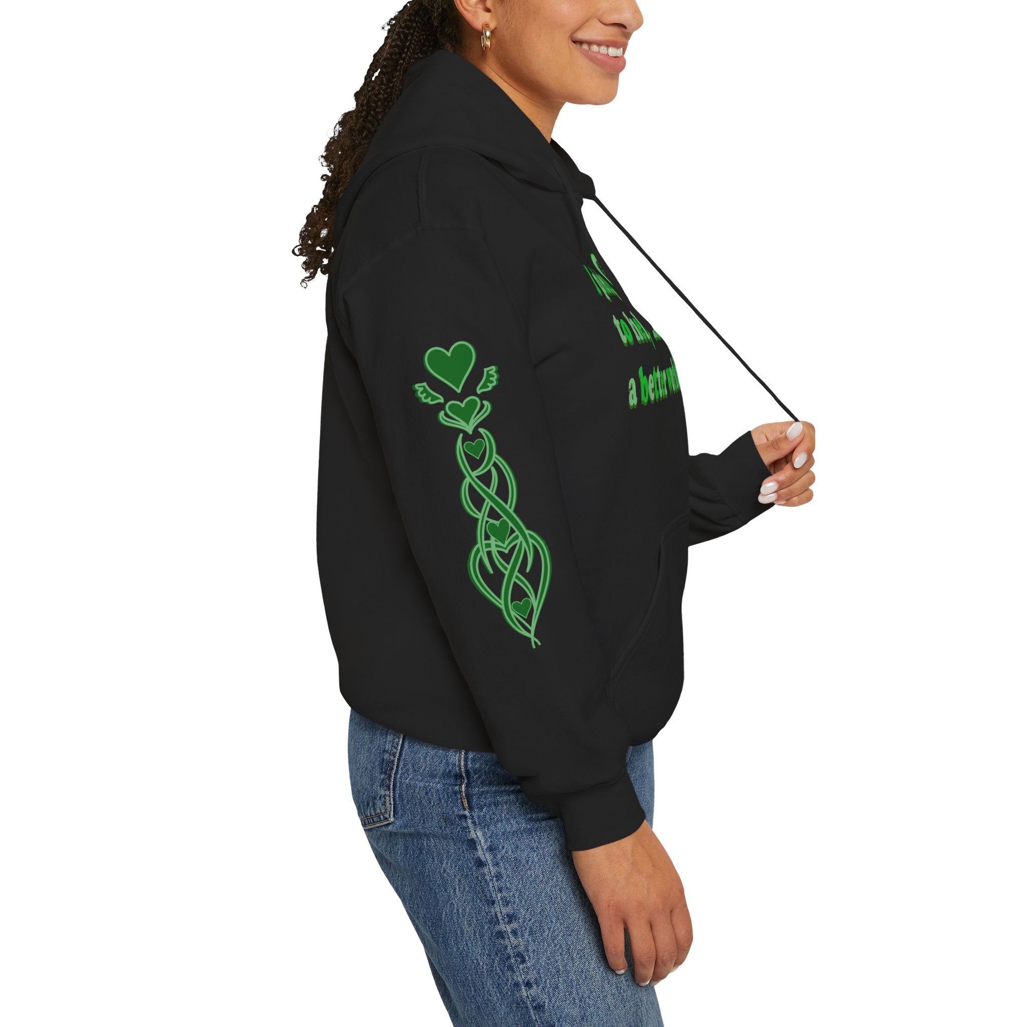 Person wearing a black hoodie with green designs