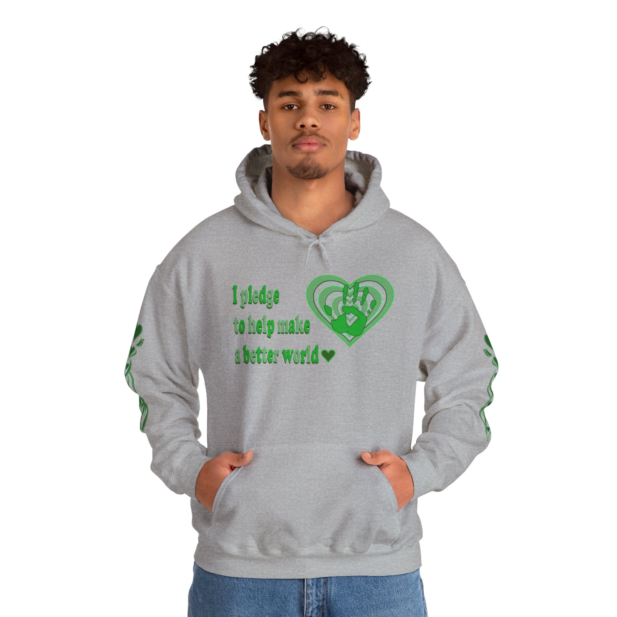 Person wearing a grey hoodie with green text and heart design