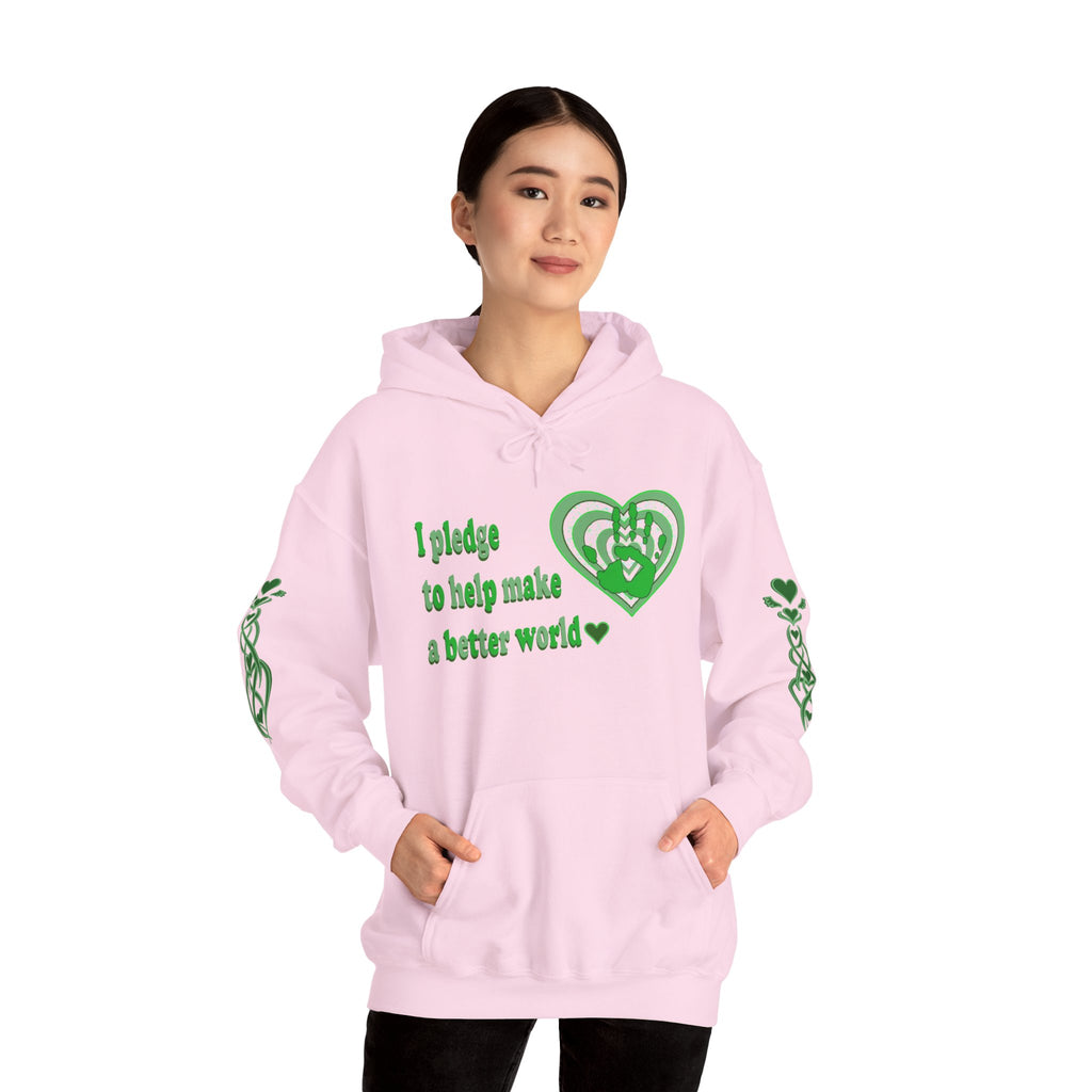 Person wearing a pink hoodie with green text and heart design