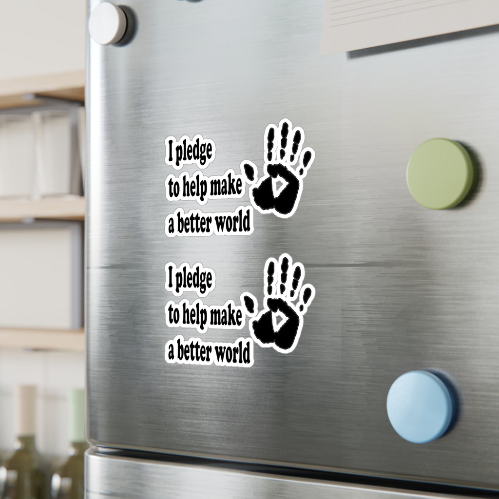 Stickers on a refrigerator with a handprint and some text that says 'I pledge to help make a better world'
