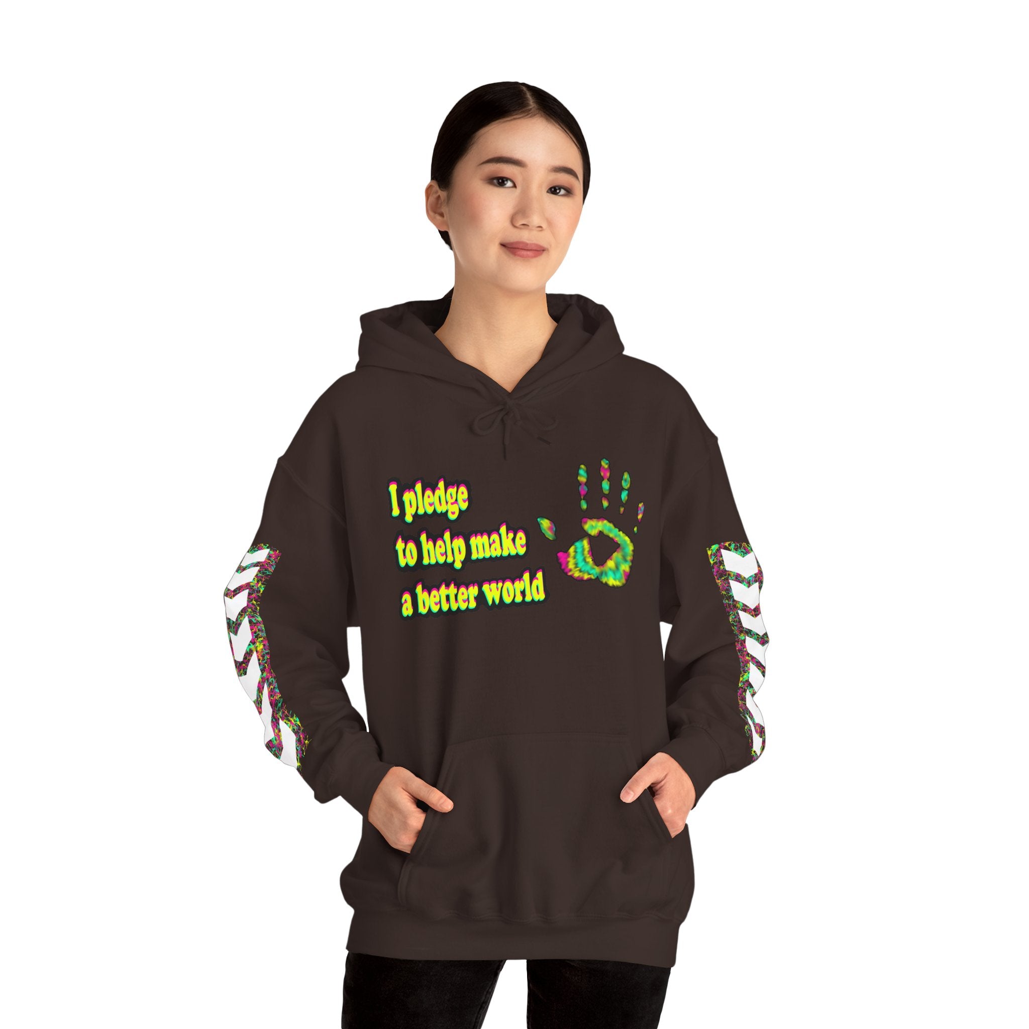 Person wearing a brown hoodie with text that reads 'I pledge to help make a better world' with designs of a colourful handprint on a white background