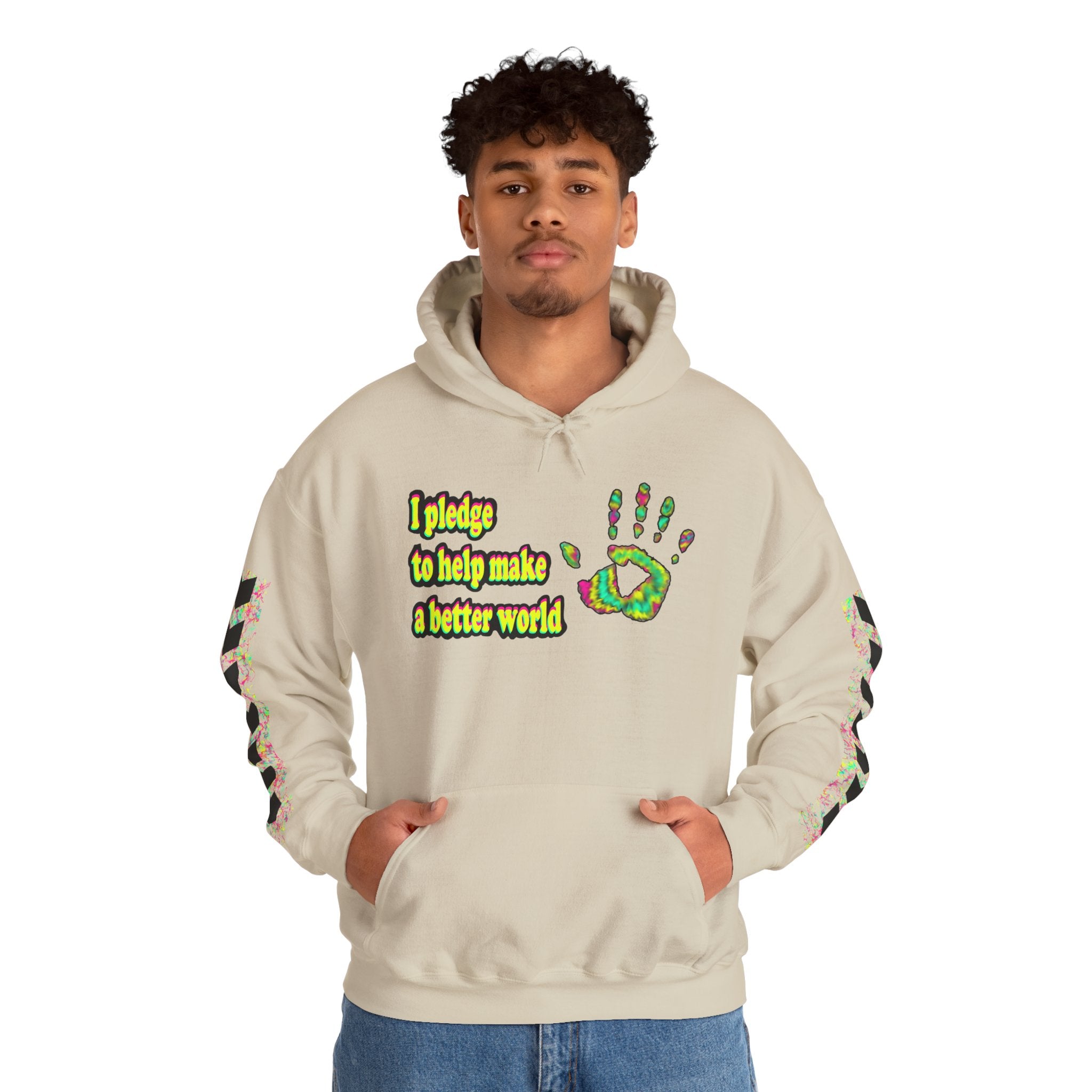 Person wearing a beige hoodie with colorful text that reads 'I pledge to help make a better world' and graphics of a handprint on a white background