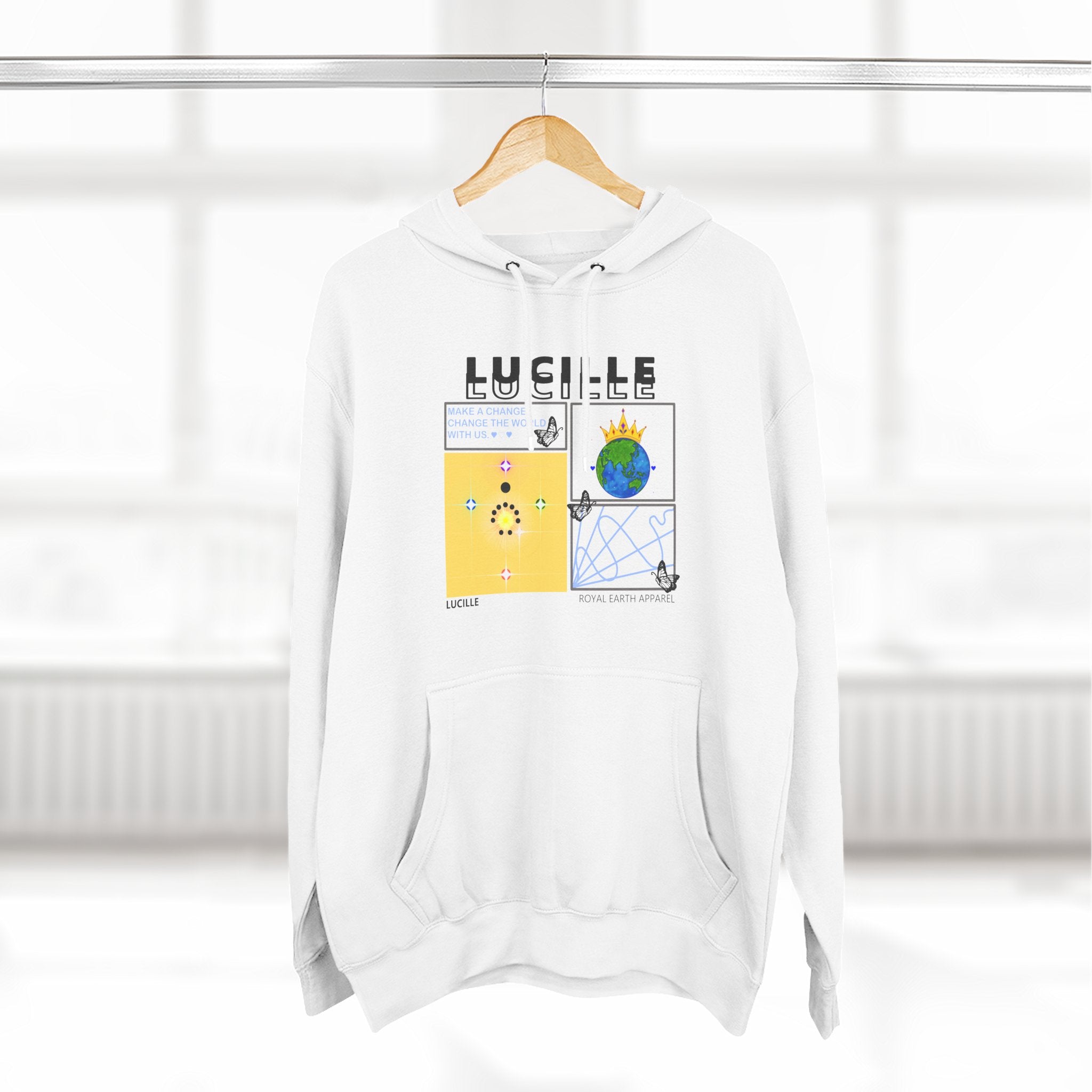 White hoodie with a Lucille graphic design on a hanger against a white background
